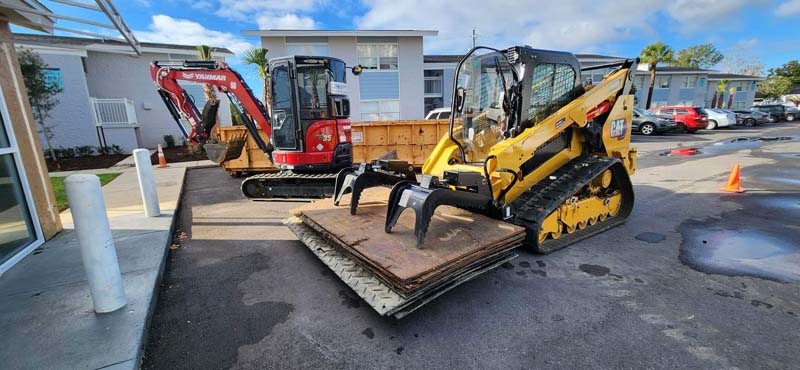 SKS Aquatic demolition equipment staged for structure removal and disposal