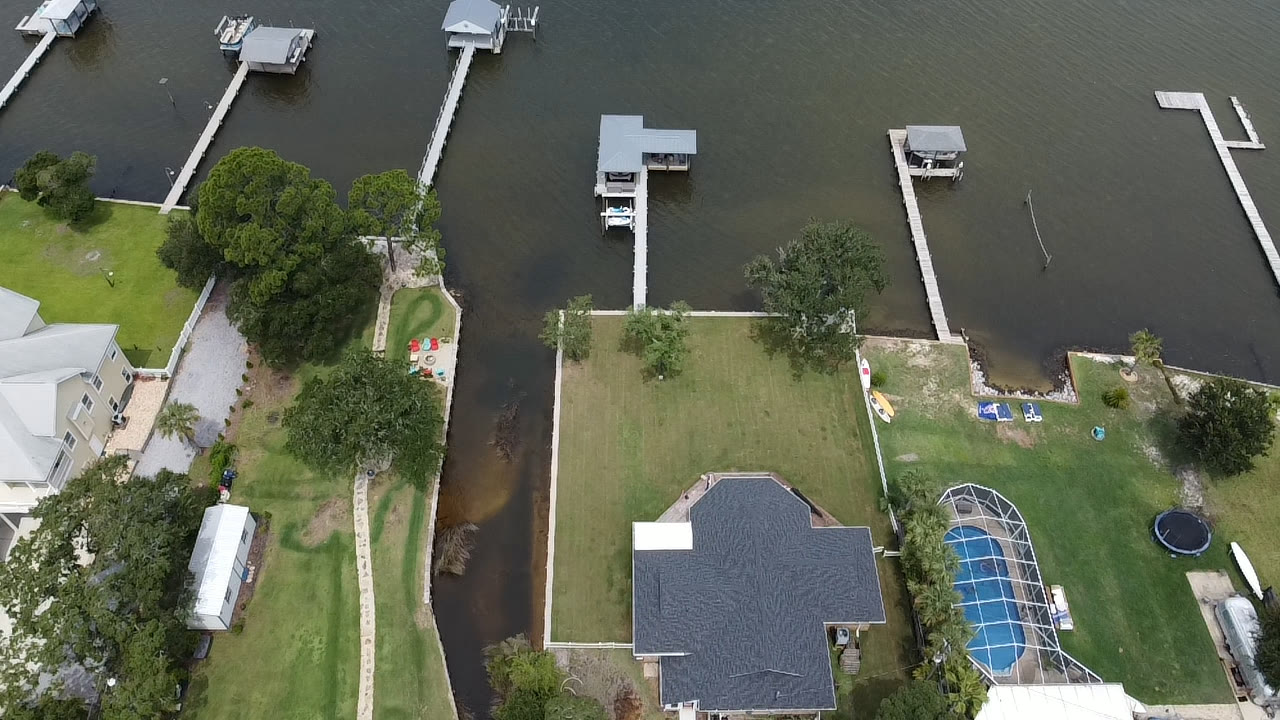 Overhead view of SKS Aquatic seawall and dock layout on a canal