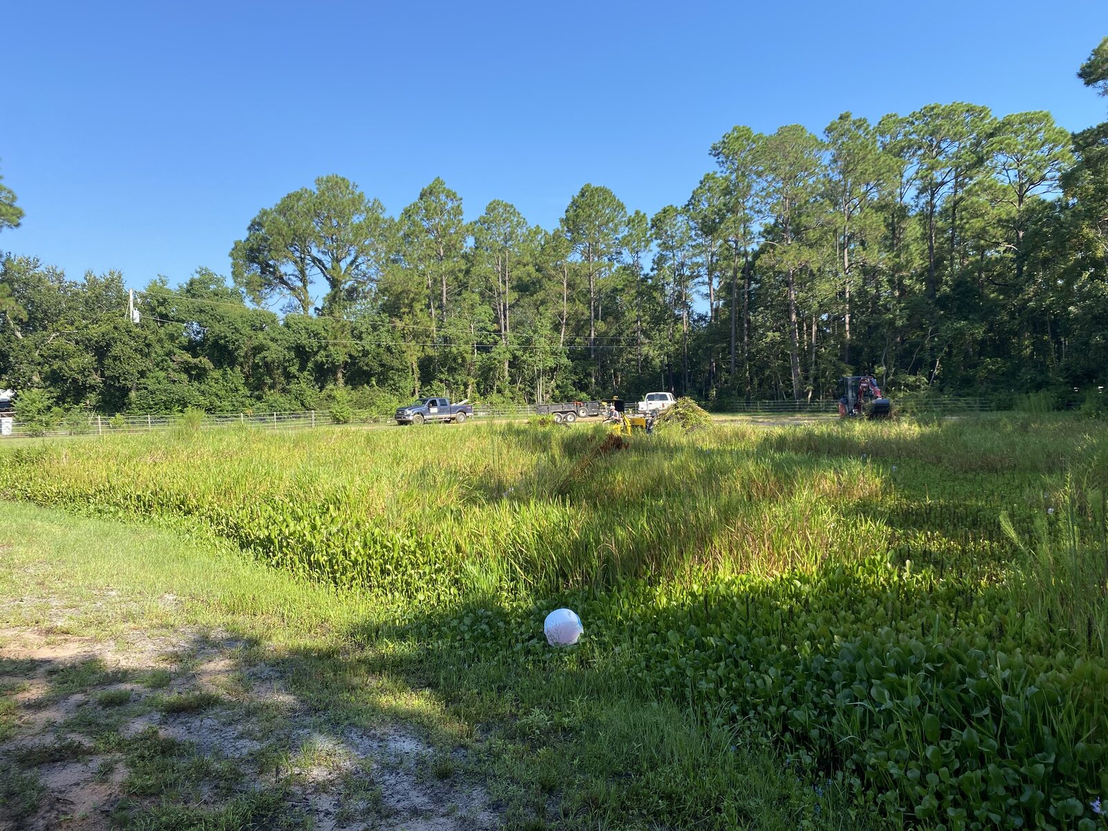 Ponds & Lakes by SKS Aquatic on the Gulf Coast — Amphibious dredge on site