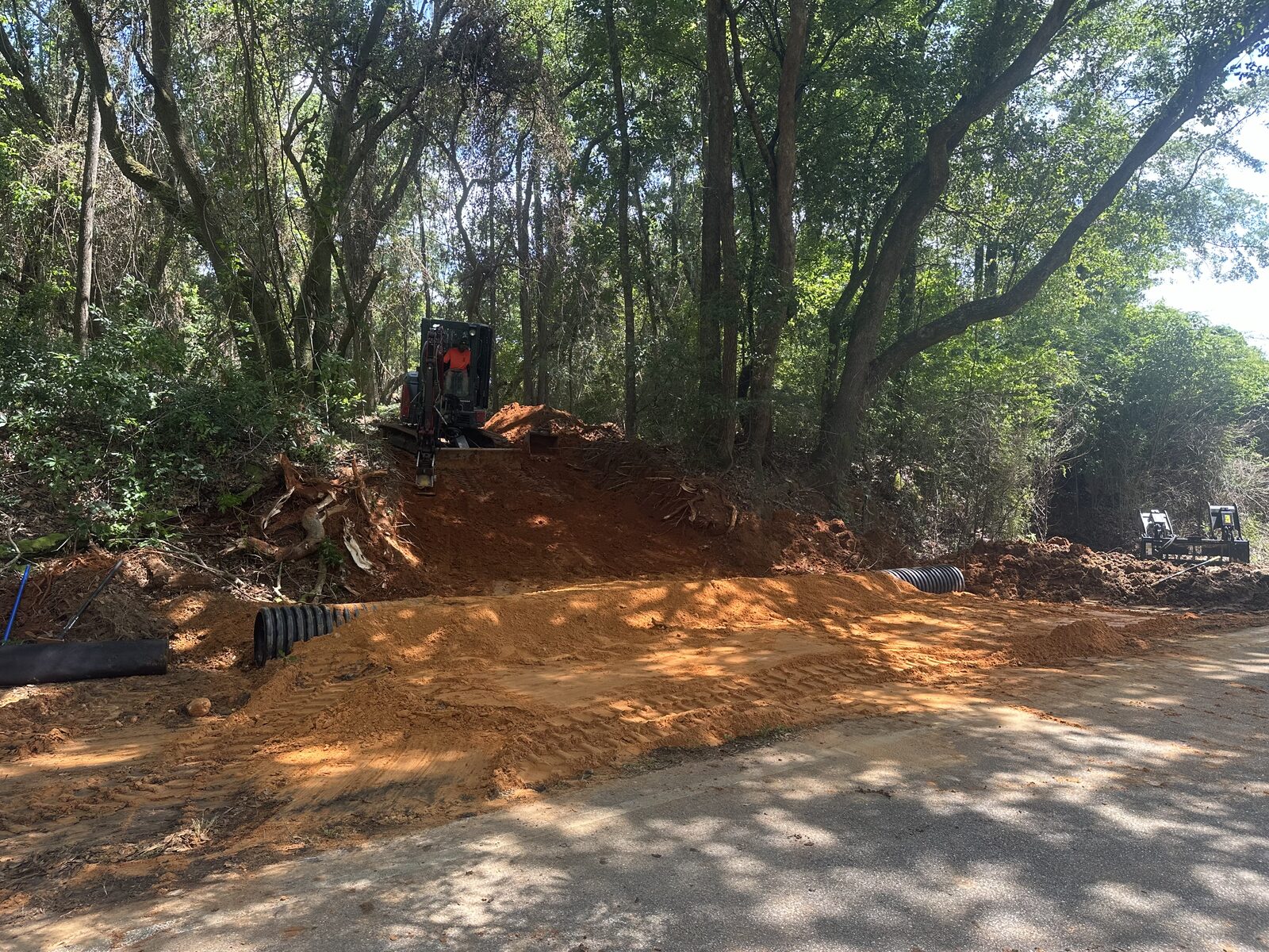 Land Clearing & Site Work by SKS Aquatic on the Gulf Coast — Skid steer clearing