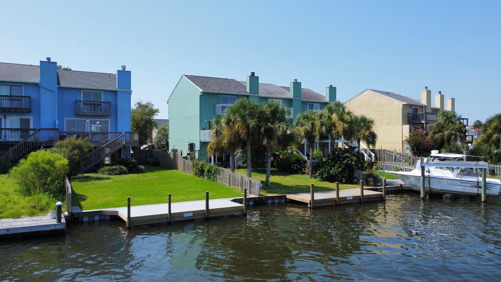 Crew setting pilings for a new dock on a Northwest Florida waterway